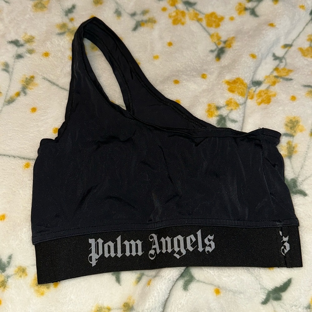 Palm Angels Crop Top
Black
Graphic Print
Sleeveless with One-Shoulder